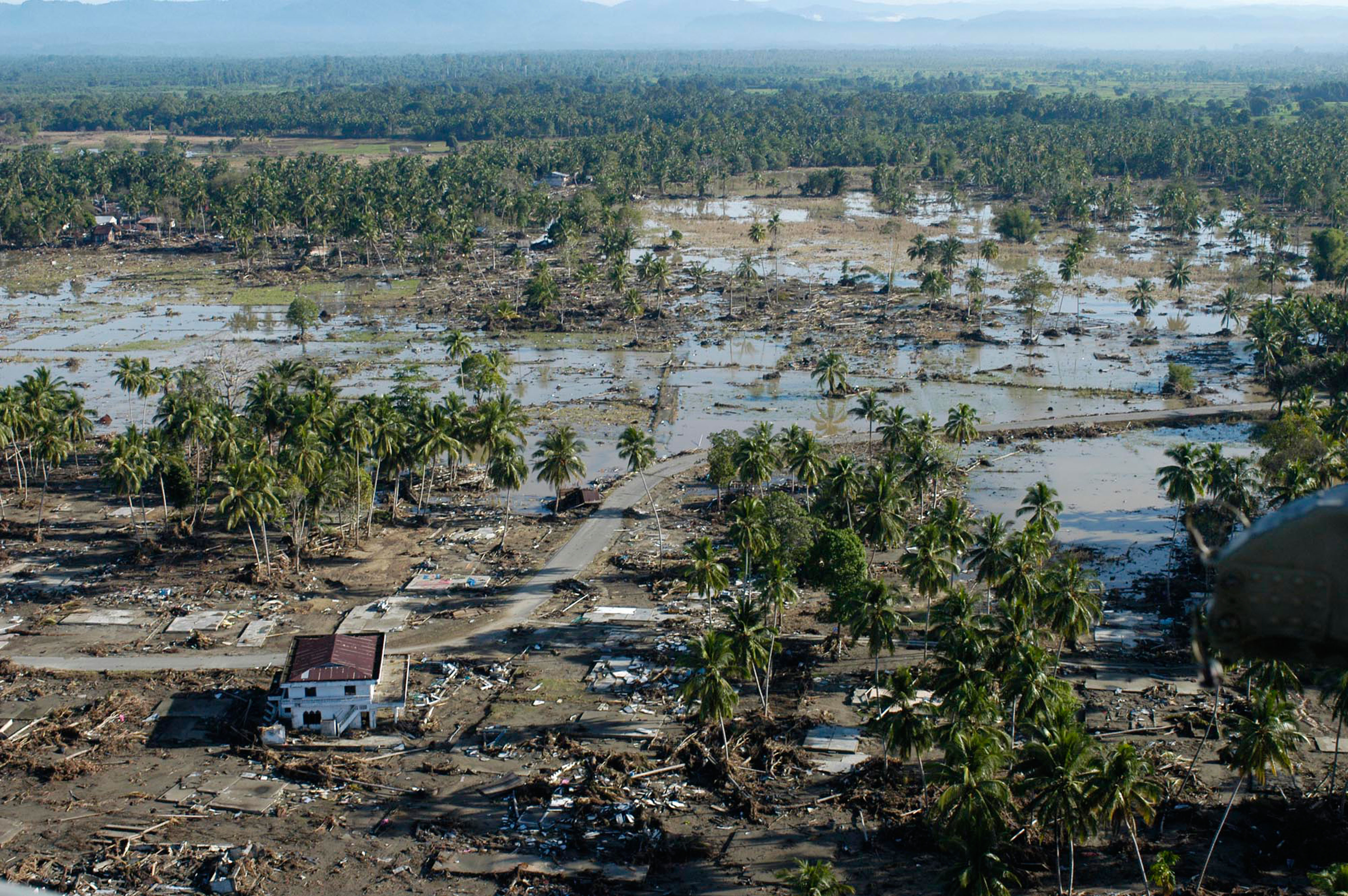 Aerial view of the tsunami damage in the village of Keude Teunom in Aceh Indonesia. Photo: © Boitano Photography